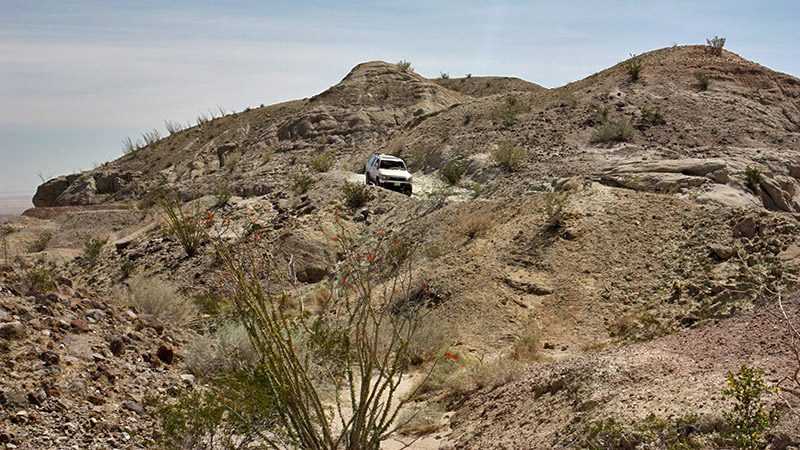 The road twists thru rugged landscape